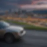 A scenic view of Pittsburgh with a car dealership in the foreground