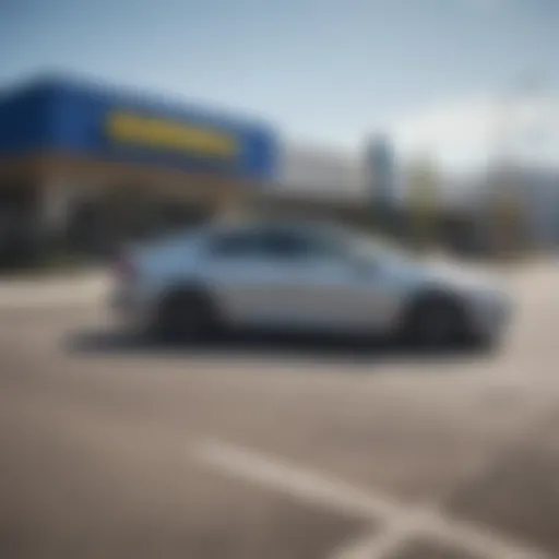 A sleek car parked outside a CarMax location.