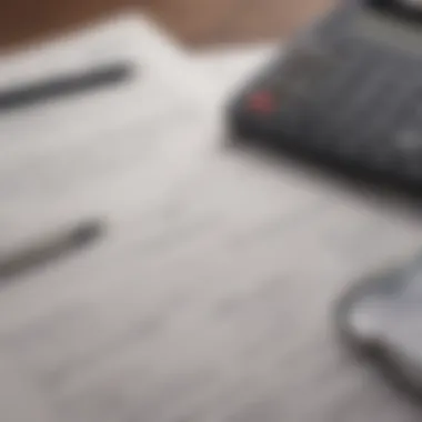 A close-up of mortgage paperwork and a calculator