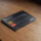 Close-up of a Micro Center credit card on a wooden desk