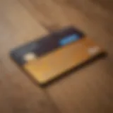 A close-up view of a PayPal Credit Card on a wooden surface, showcasing its sleek design.