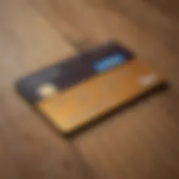 A close-up view of a PayPal Credit Card on a wooden surface, showcasing its sleek design.