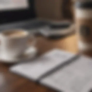 A budgeting notebook next to a coffee cup, representing financial discipline